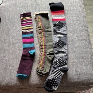 Bundle of three pairs of women’s knee and over the knee socks.